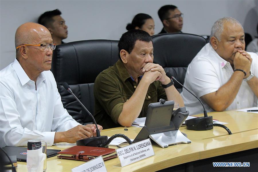 PHILIPPINES-QUEZON CITY-PRESIDENT-CONFERENCE-TYPHOON